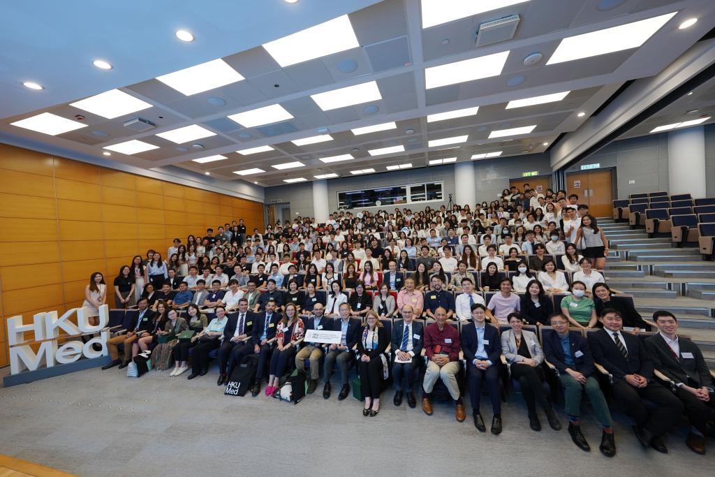 Large group of HKUMed students and faculty.